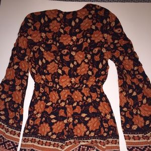Floral romper jumpsuit size S under $10